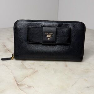 Prada Saffiano leather bow zip-around continental wallet